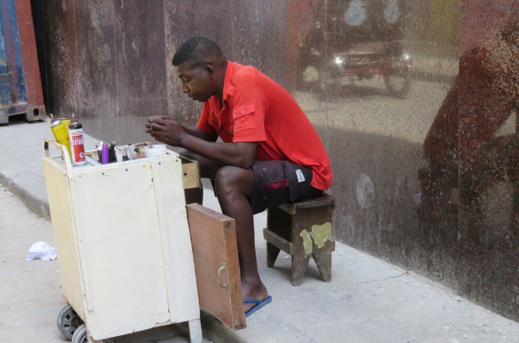 Private enterprise: a vendor refilling disposable lighters.