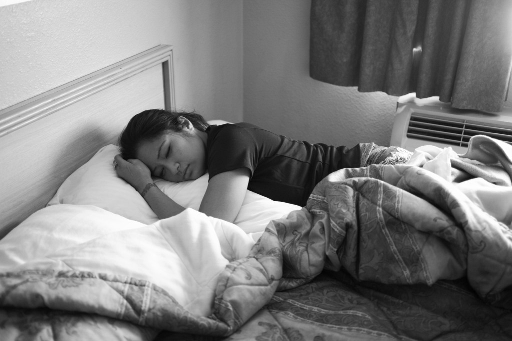 Casey tries to take a quick nap in-between weigh-in sessions before her pro-debut fight.