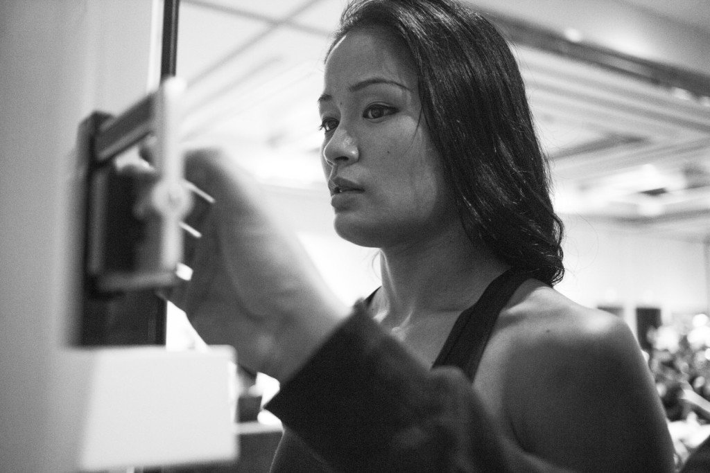 Casey awaits anxiously to see what number appears on the scale during her first weigh-in the day before her big fight. Weigh-ins for boxers are the moment of truth: if a boxer does not make weight, they cannot compete in the fight.