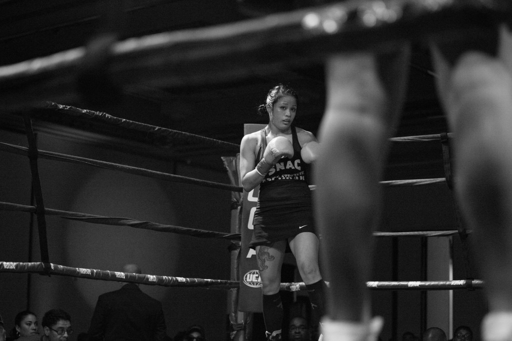 Both Casey and her opponent, Blanca Raymundo, wait in their designated corners and get ready to begin the fight in Sacramento, CA.