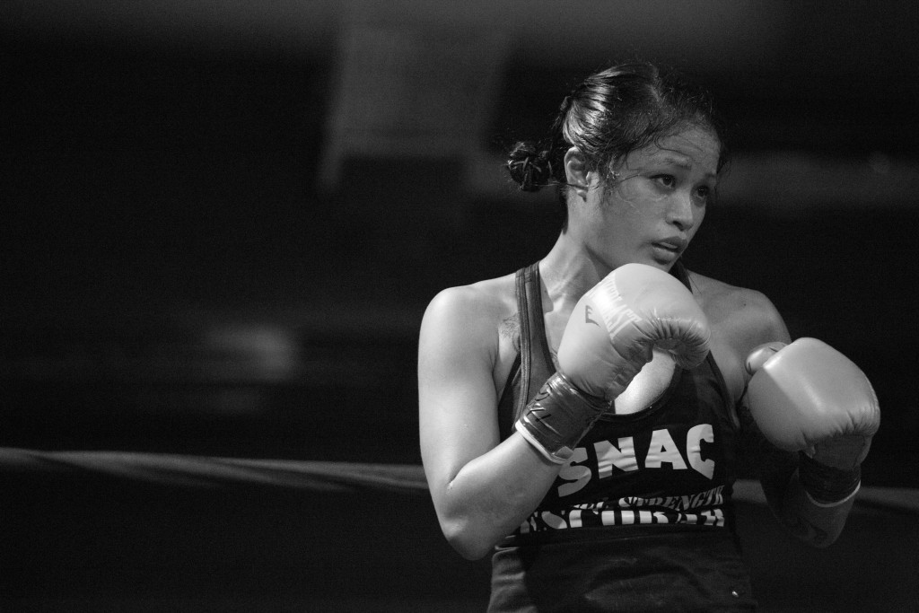 Contemplating her next move, Casey eyes up her opponent, Blanca Raymundo, during one of three rounds during her pro-debut fight in Sacramento, CA.