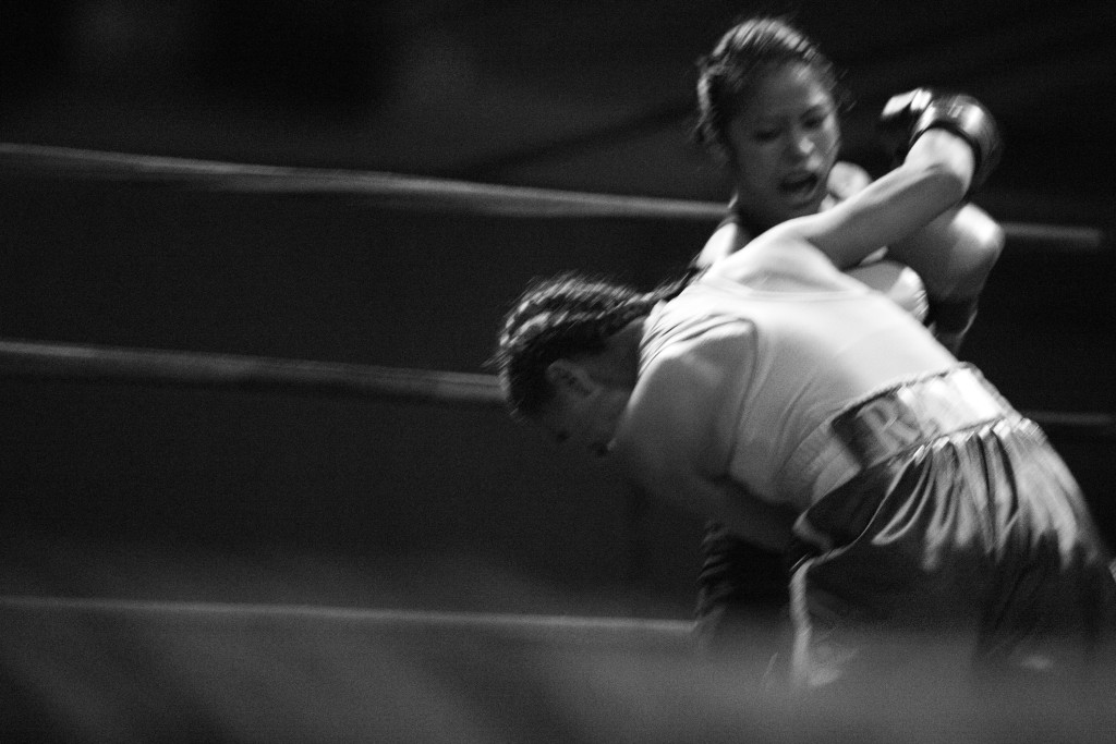 Casey delivers a staggering punch to her opponent, Blanca Raymundo, during her pro-debut fight in Sacramento, CA.