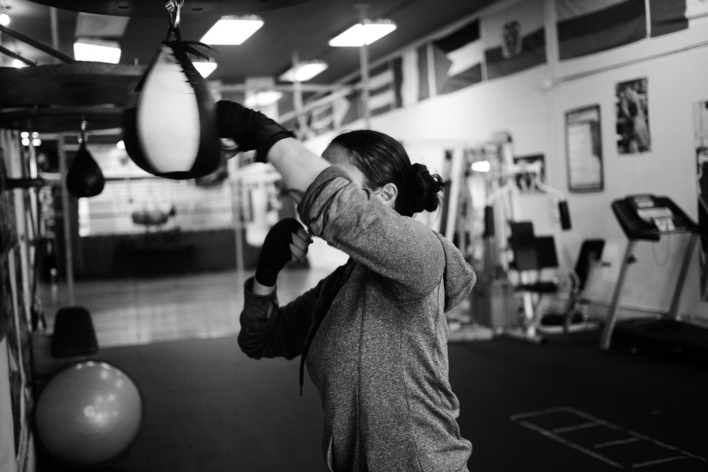 Casey practices her punches on a speed bag at World Class Boxing Gym in San Francisco, CA.